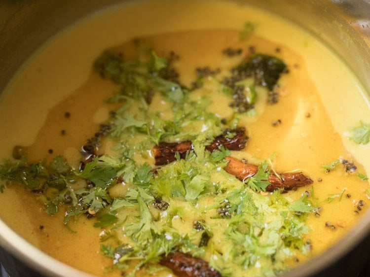 chopped coriander leaved added to thengai paal rasam. 