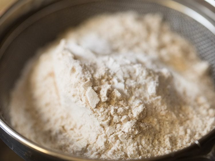 whole wheat flour, salt and baking powder in a sieve