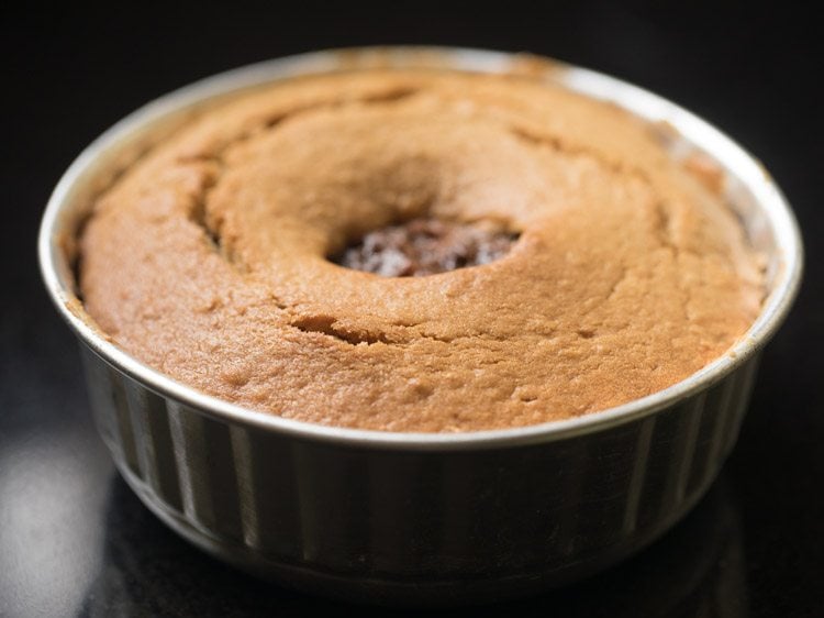 sour cream cake is baked and has a lovely golden top.