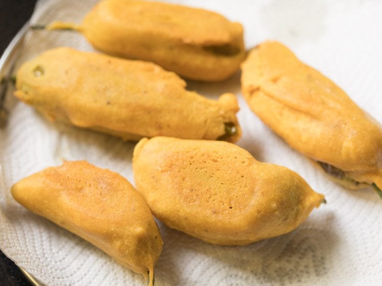 fried mirchi bajji on kitchen paper towels. 