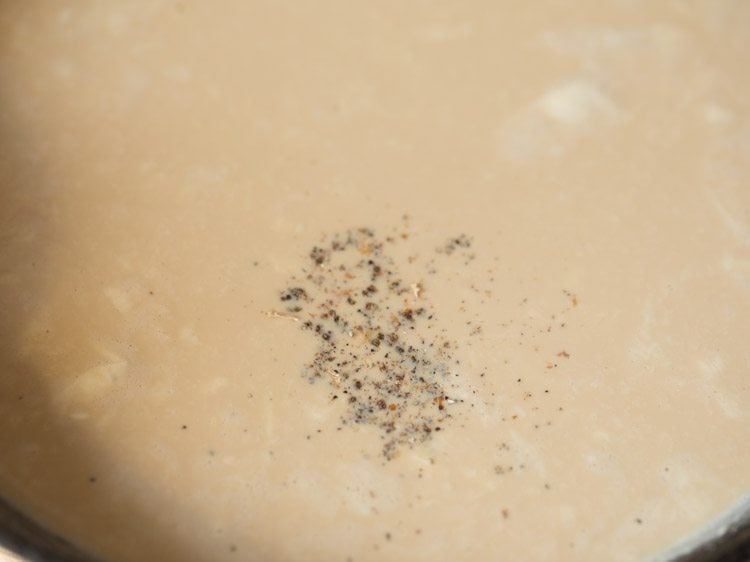 cardamom powder added to jaggery-milk mixture. 