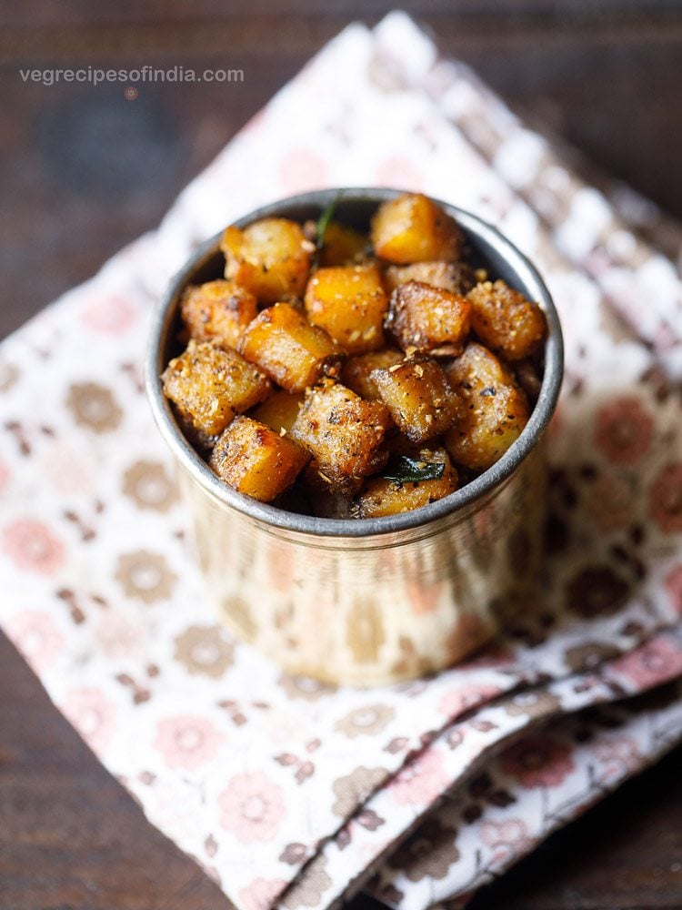 vazhakkai varuval served in a steel container. 