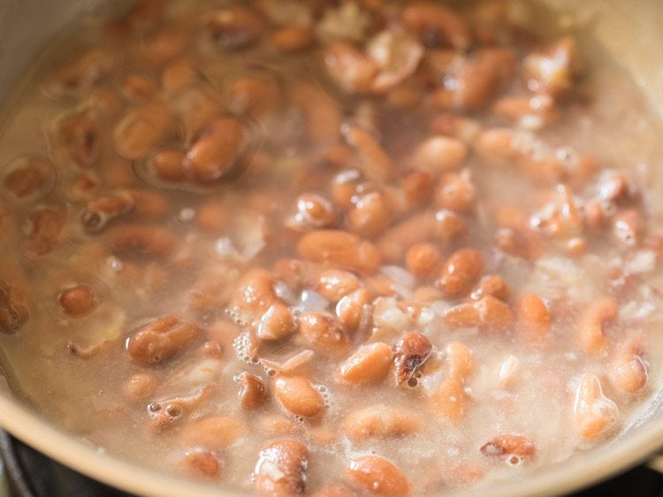 water added to kidney beans for making refried beans. 