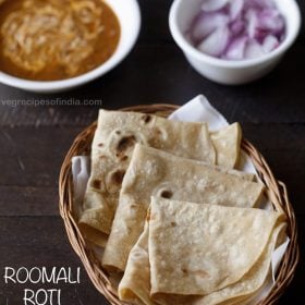 rumali roti folded and served in a basket with a bowl of curry and a bowl of onions kept in the background and text layover.