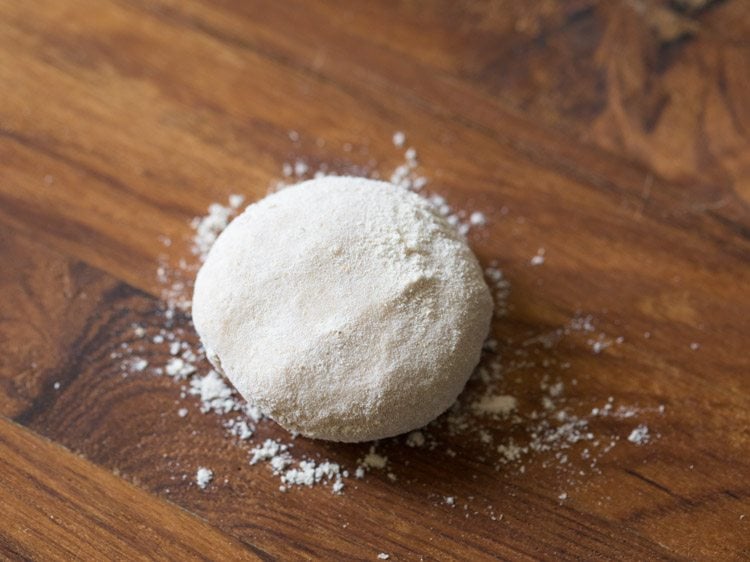 dough ball sprinkled with some whole wheat flour. 