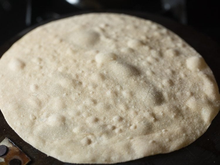 blisters appearing on rumali roti while roasting. 