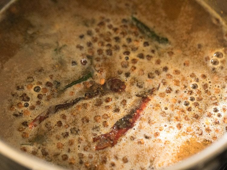 making vathal kuzhambu recipe