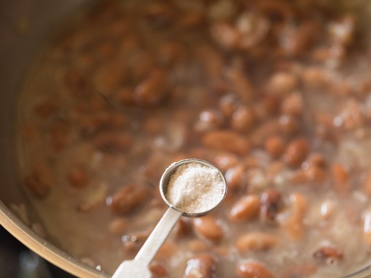 adding salt to pan. 