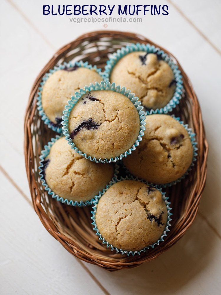 vegan blueberry muffins in a bamboo tray