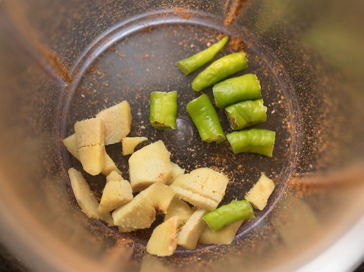 roughly chopped ginger and chopped green chilies added to the grinder jar. 