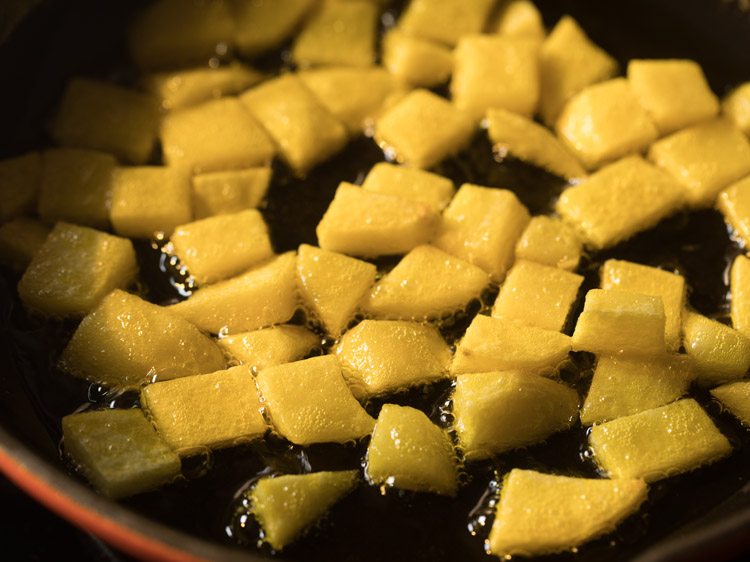 pan frying potatoes till almost cooked. 