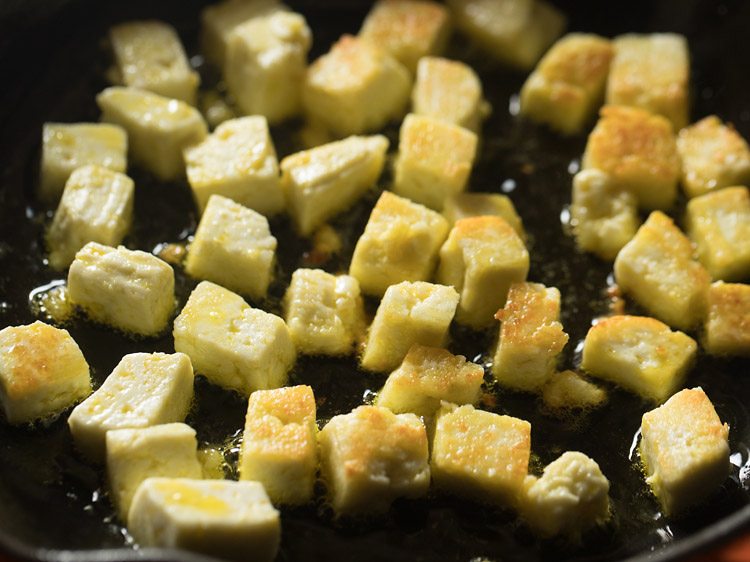 pan frying paneer cubes till light golden. 