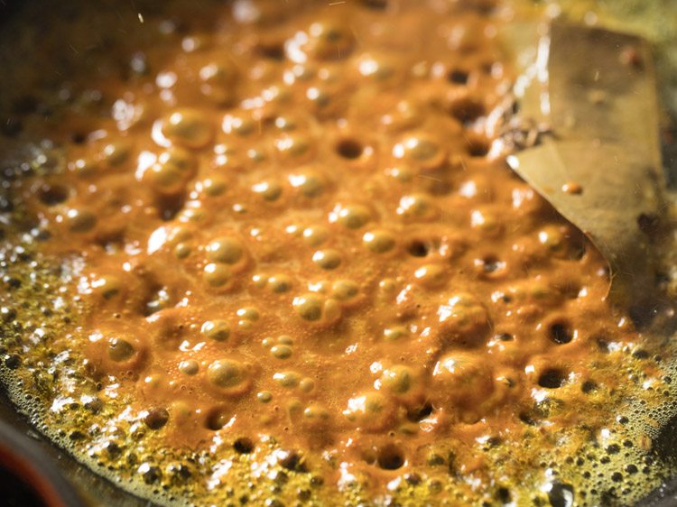 prepared masala paste added to the pan. 