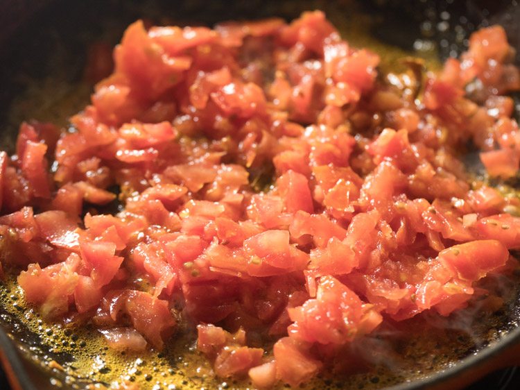 tomatoes mixed well with the masala paste. 