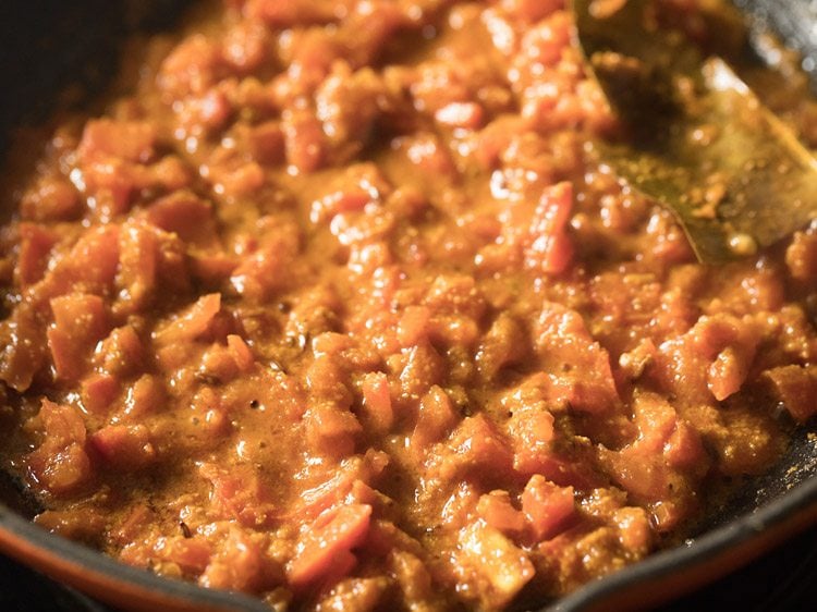 water added to tomato mixture and continued to sauté. 