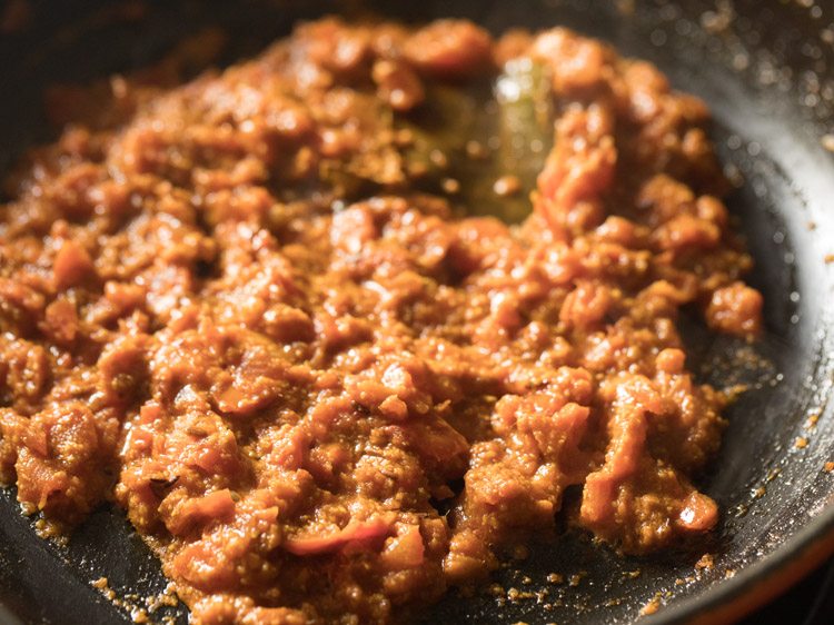 sautéing tomato mixture till oil releases from the sides of the pan. 