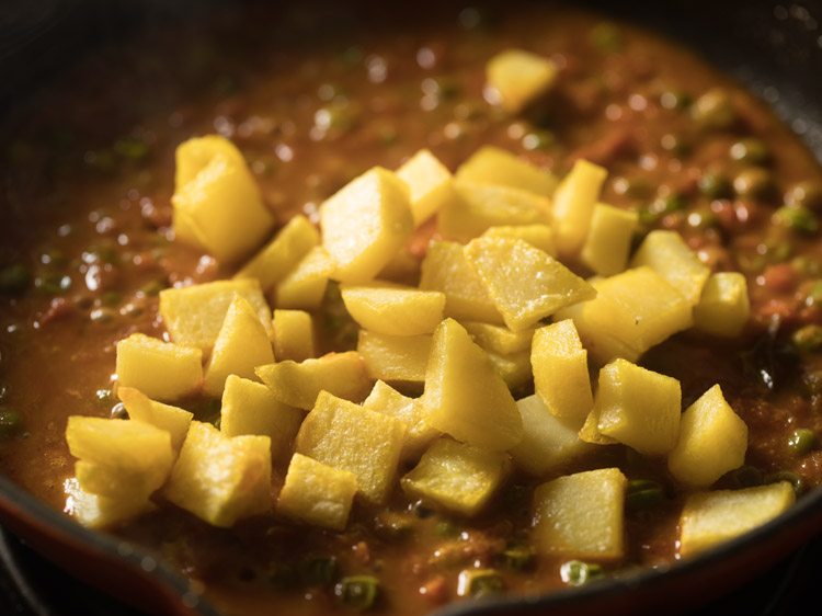 fried potatoes added to the curry. 