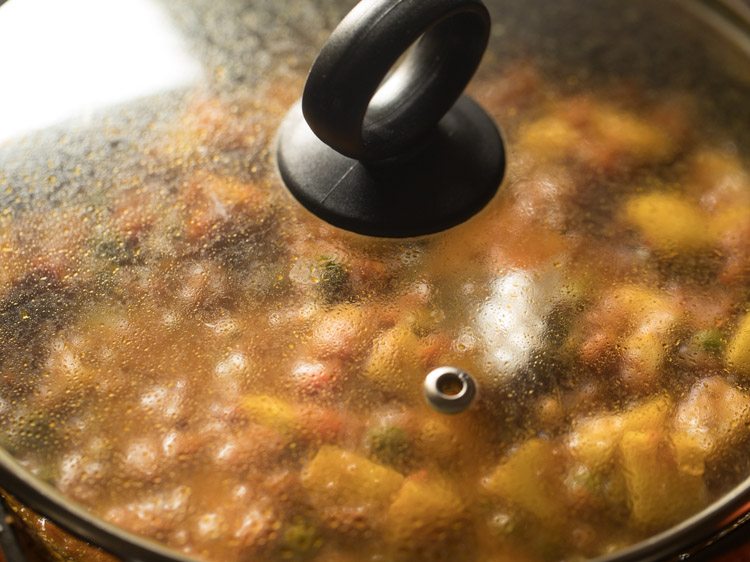 simmering curry in the covered pan. 