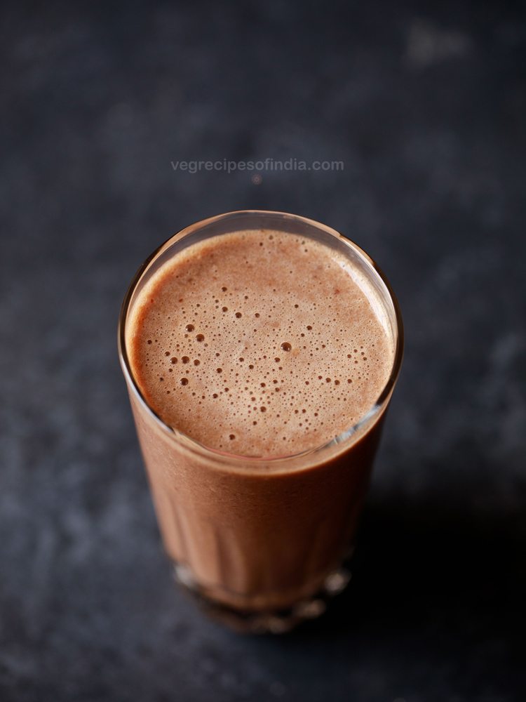 banana cherry smoothie in a glass.