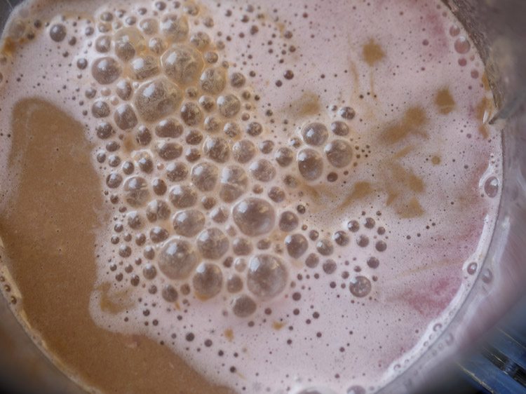 chocolate almond milk added to blender with juice.