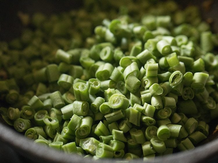 finely chopped french beans added to pan. 