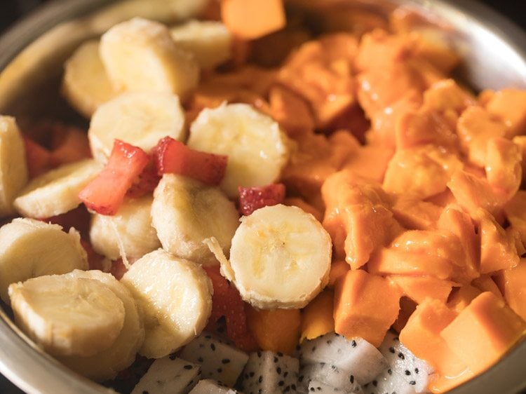 chopped mixed fruits in a bowl. 