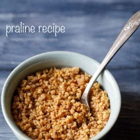 praline served in a bowl with a brass spoon.