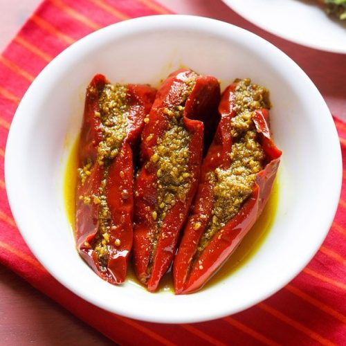 red chilli pickle in white bowl
