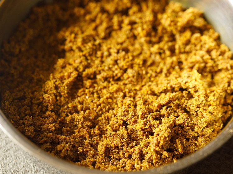 mixing mustard oil in the pickle masala 