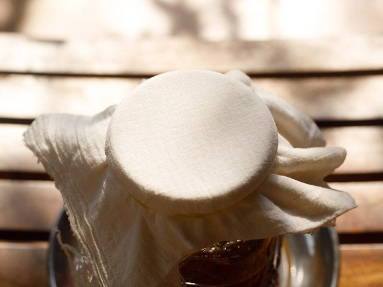 covered jar kept in the sun for the pickle to mature 