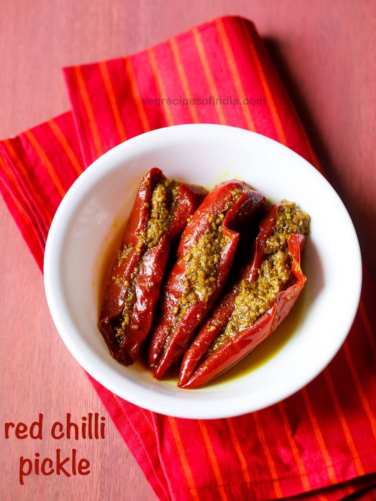 red chili pickle served in a bowl 