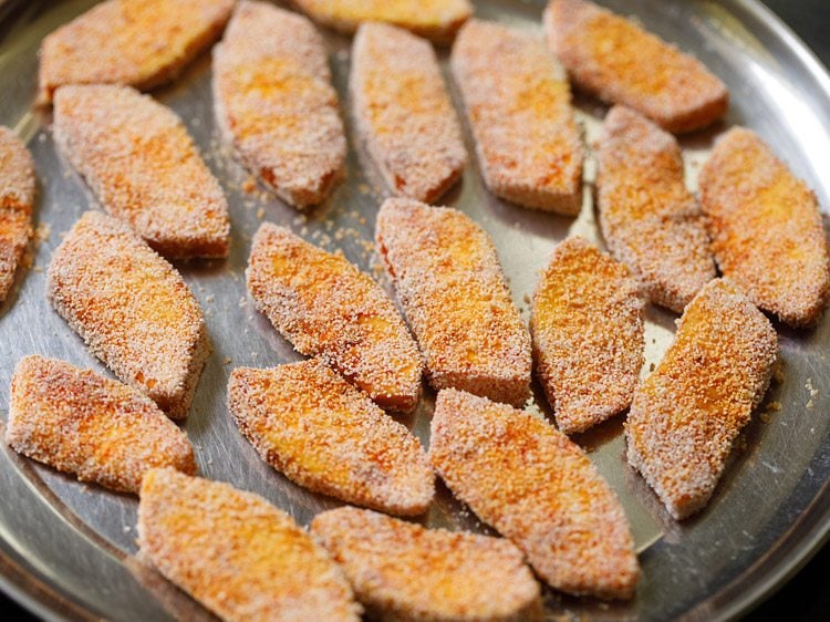 marinated breadfruit slices dredged with rava. 