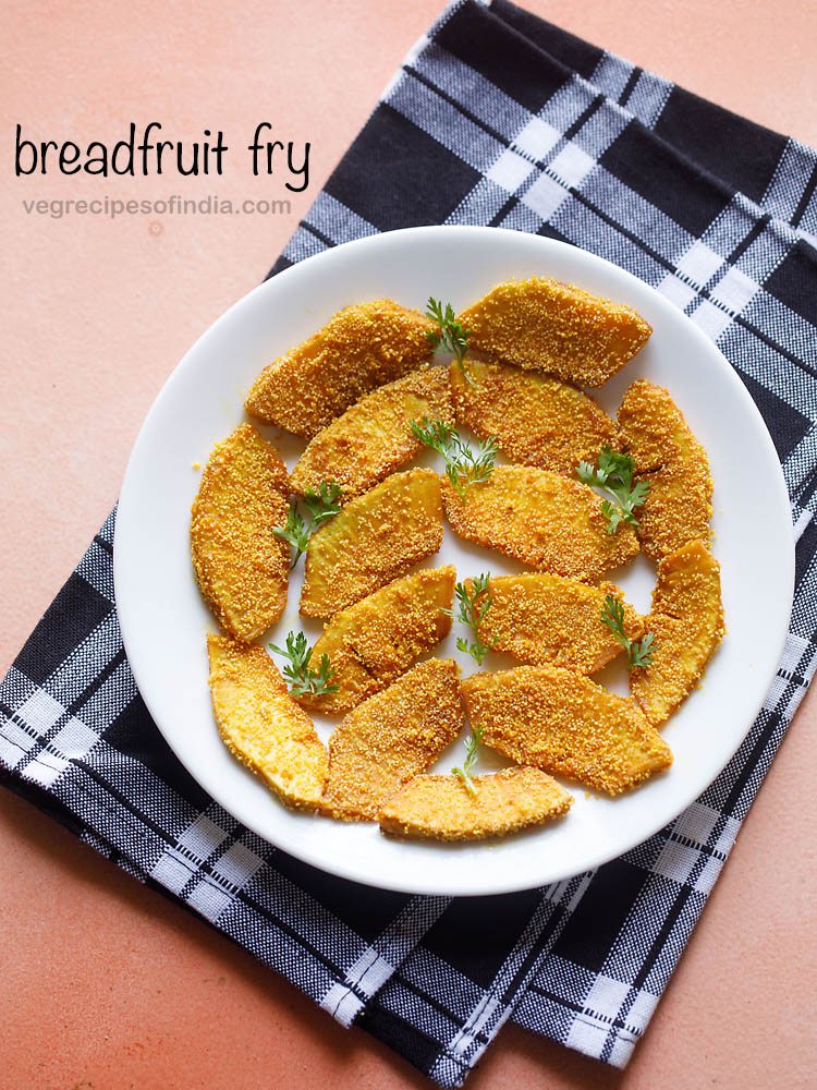 breadfruit fry garnished with coriander leaves and served on a white plate with text layover.