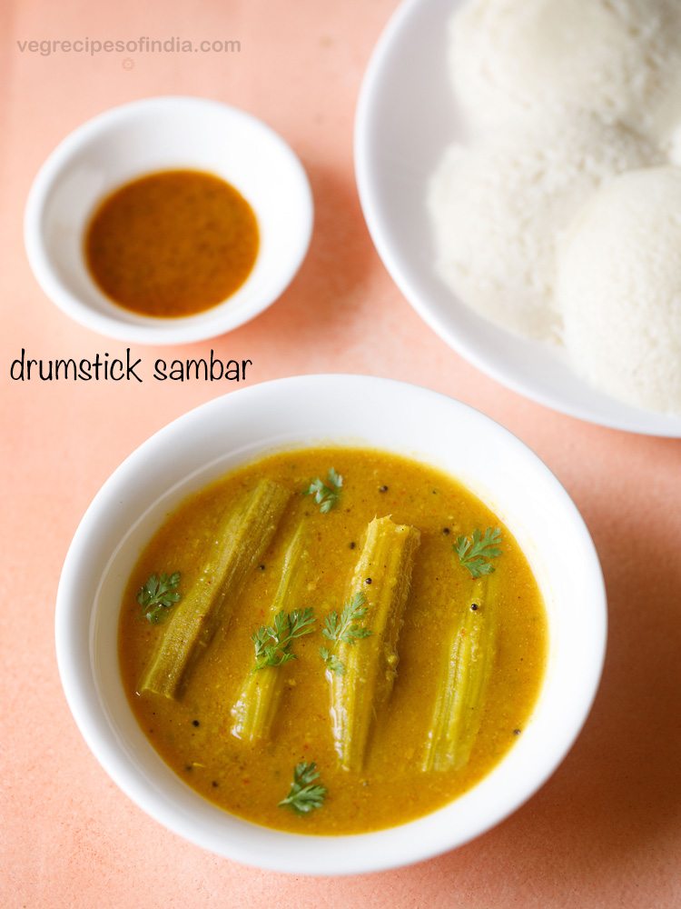 drumstick sambar served in a white bowl