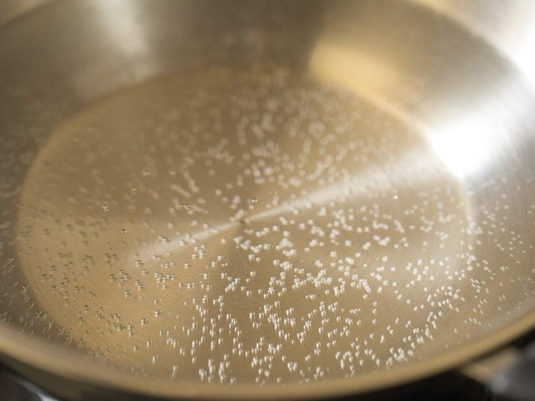 heating water in a pan. 