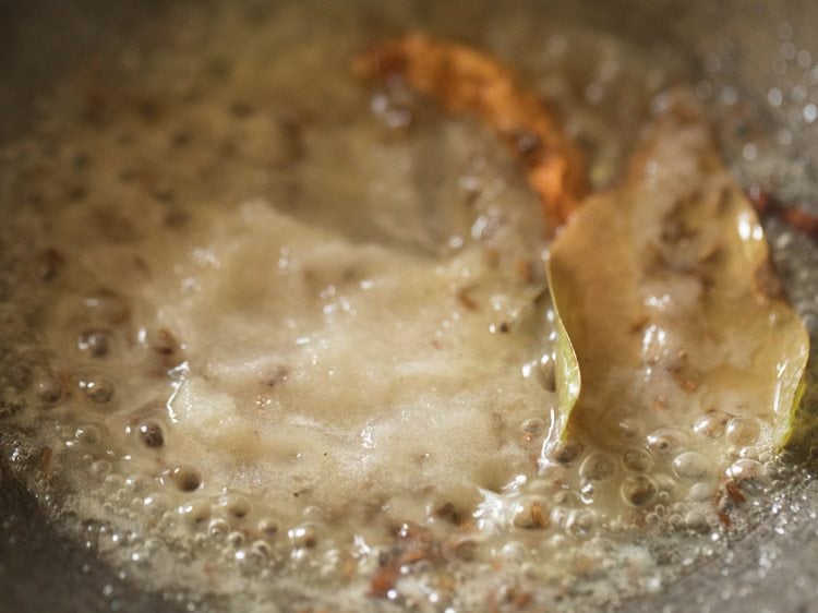 prepared onion paste added to the pan. 