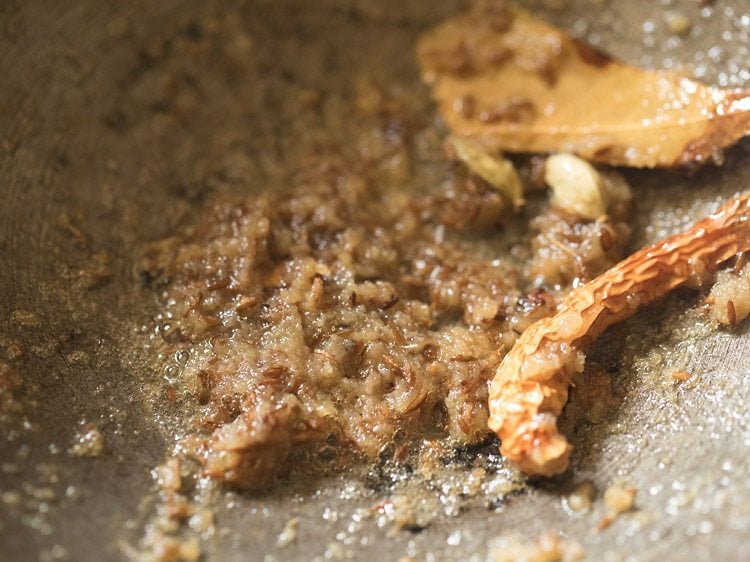 sautéing onion paste till golden. 