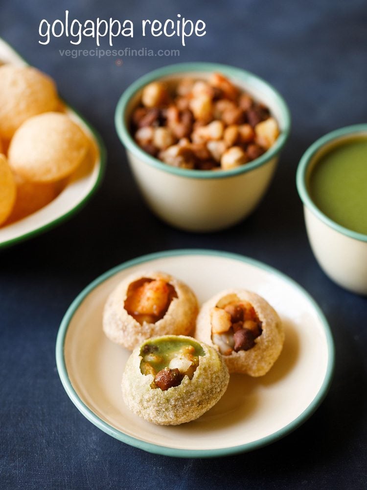 golgappa assembled and served on a green rimmed plate with the elements kept in the background and text layover.