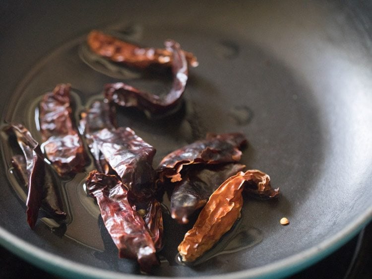 dry red chilies added to pan