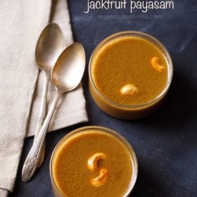 jackfruit payasam garnished with fried cashews and served in 2 bowls with 2 spoons kept on the left side and text layover.