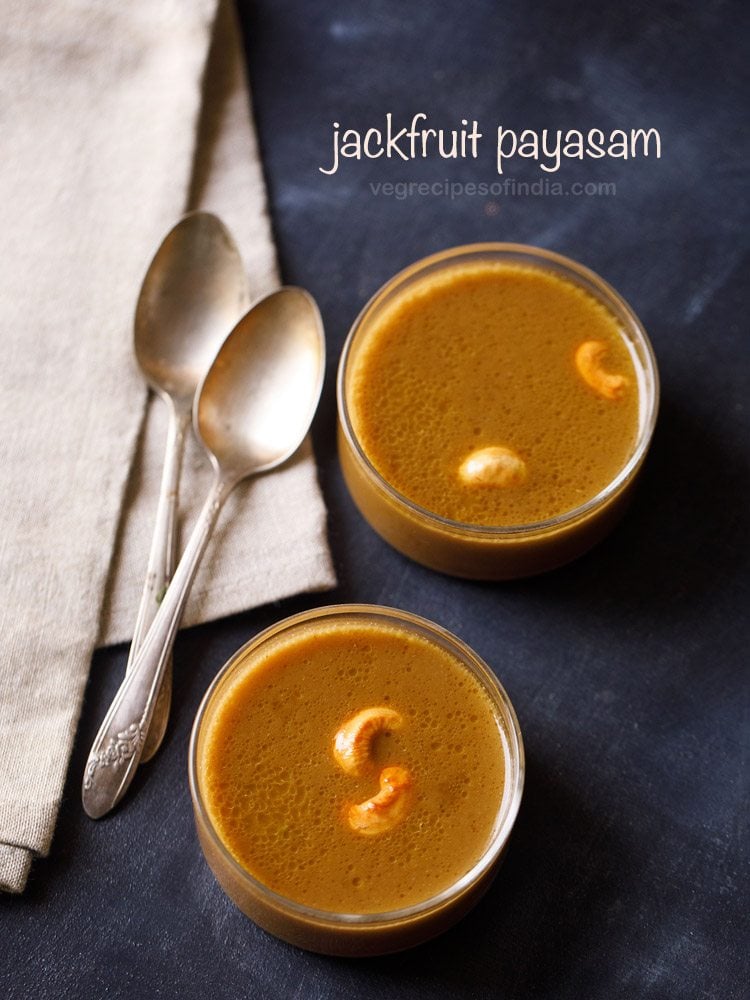 jackfruit payasam garnished with fried cashews and served in 2 bowls with 2 spoons kept on the left side and text layover.