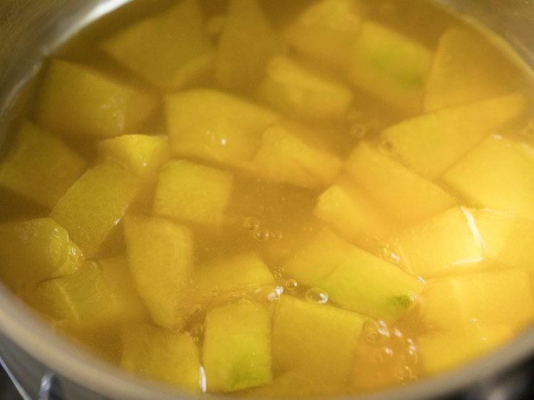 cooking ash gourd for mor kuzhambu. 