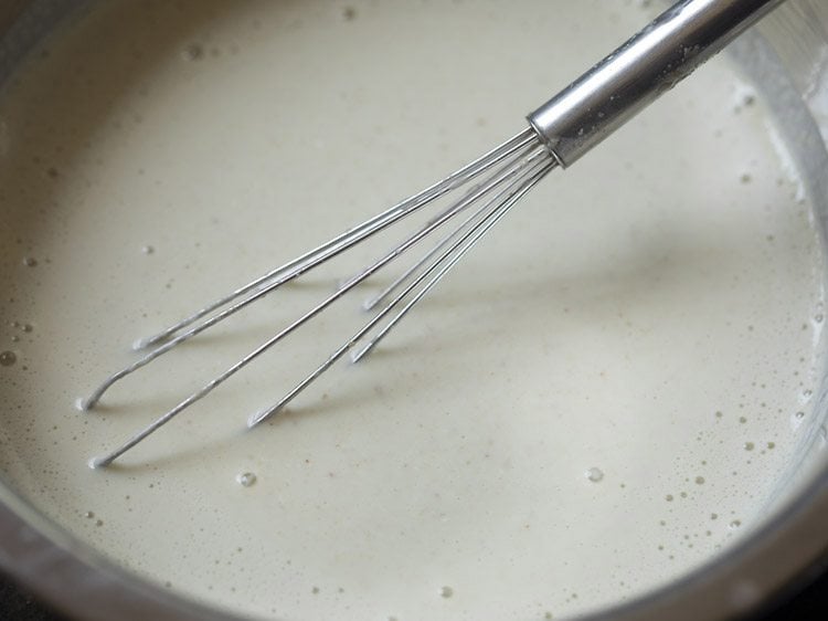 water mixed well in the curd mixture for mor kuzhambu. 