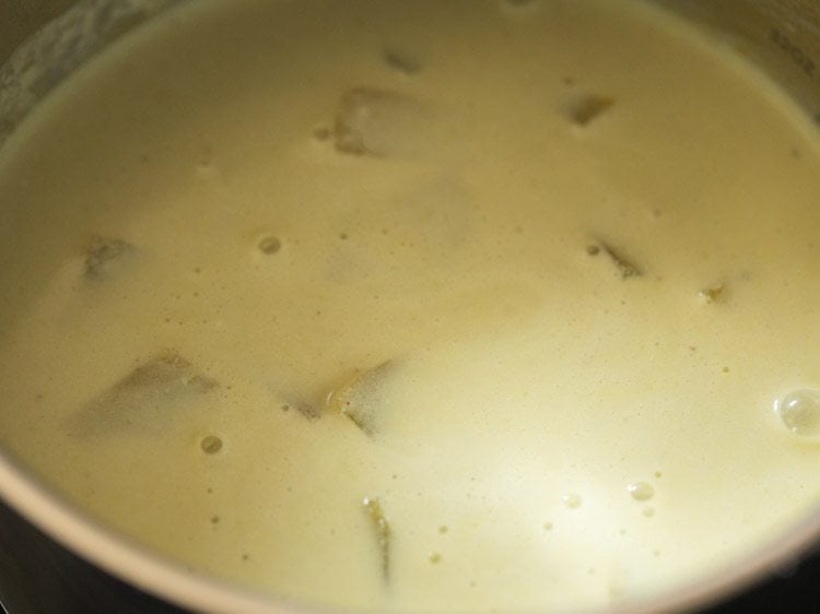 curd mixture mixed well with the ash gourd. 