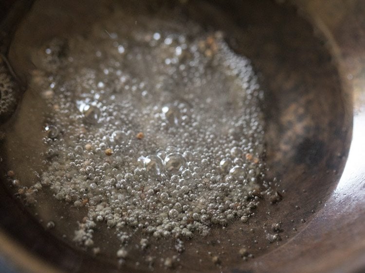 mustard seeds crackling in hot oil. 