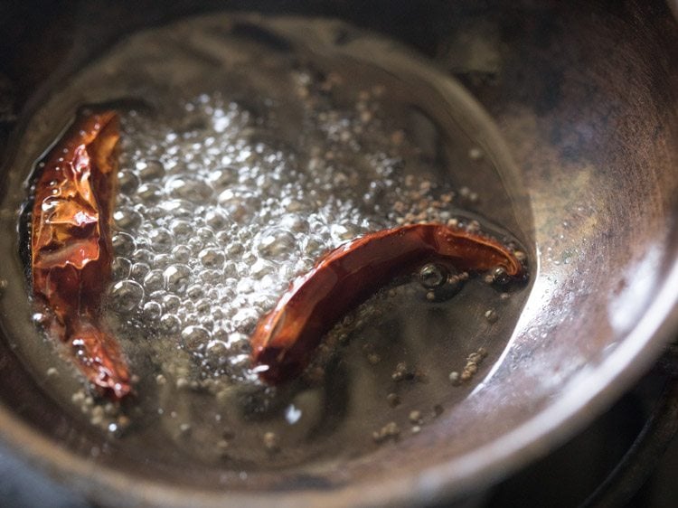 dried red chilies added to hot oil. 