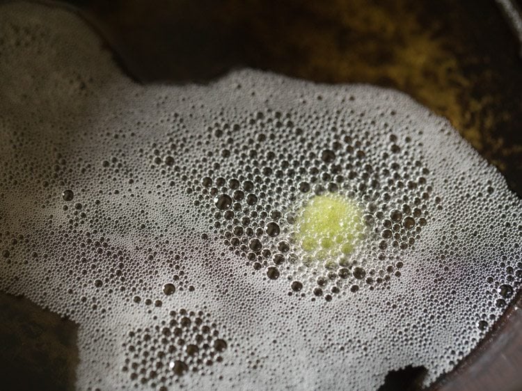 frying palak poori in hot oil