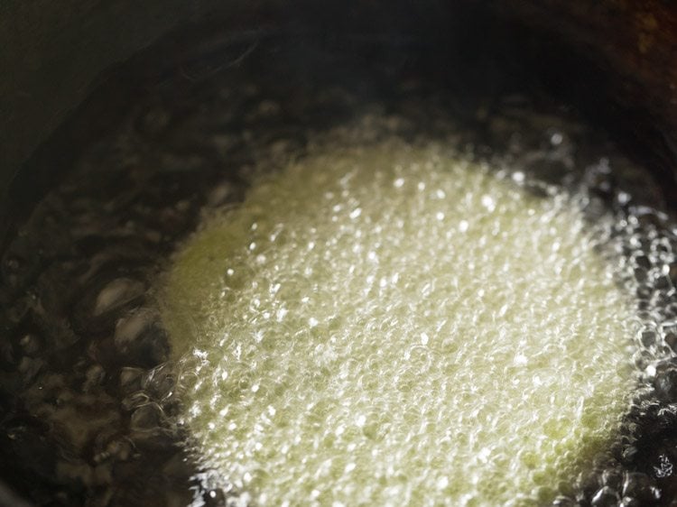 frying palak poori in hot oil