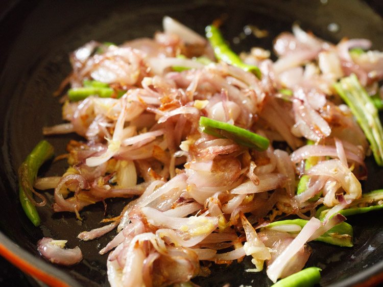 green chilies mixed with the onions and sautéing. 