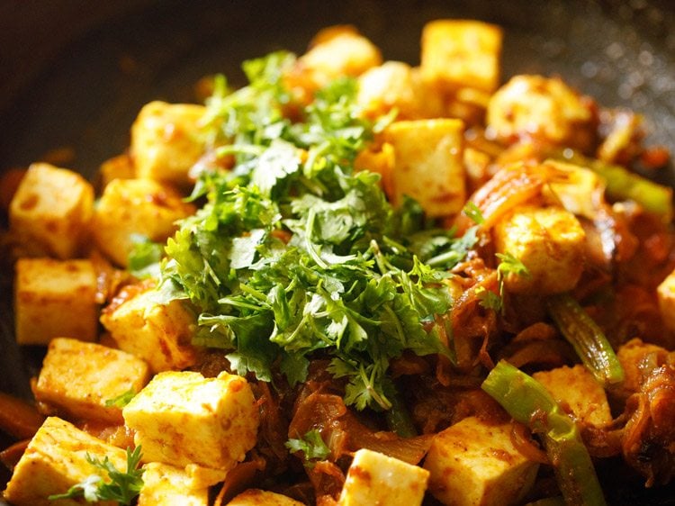 chopped coriander leaves added to the paneer fry. 